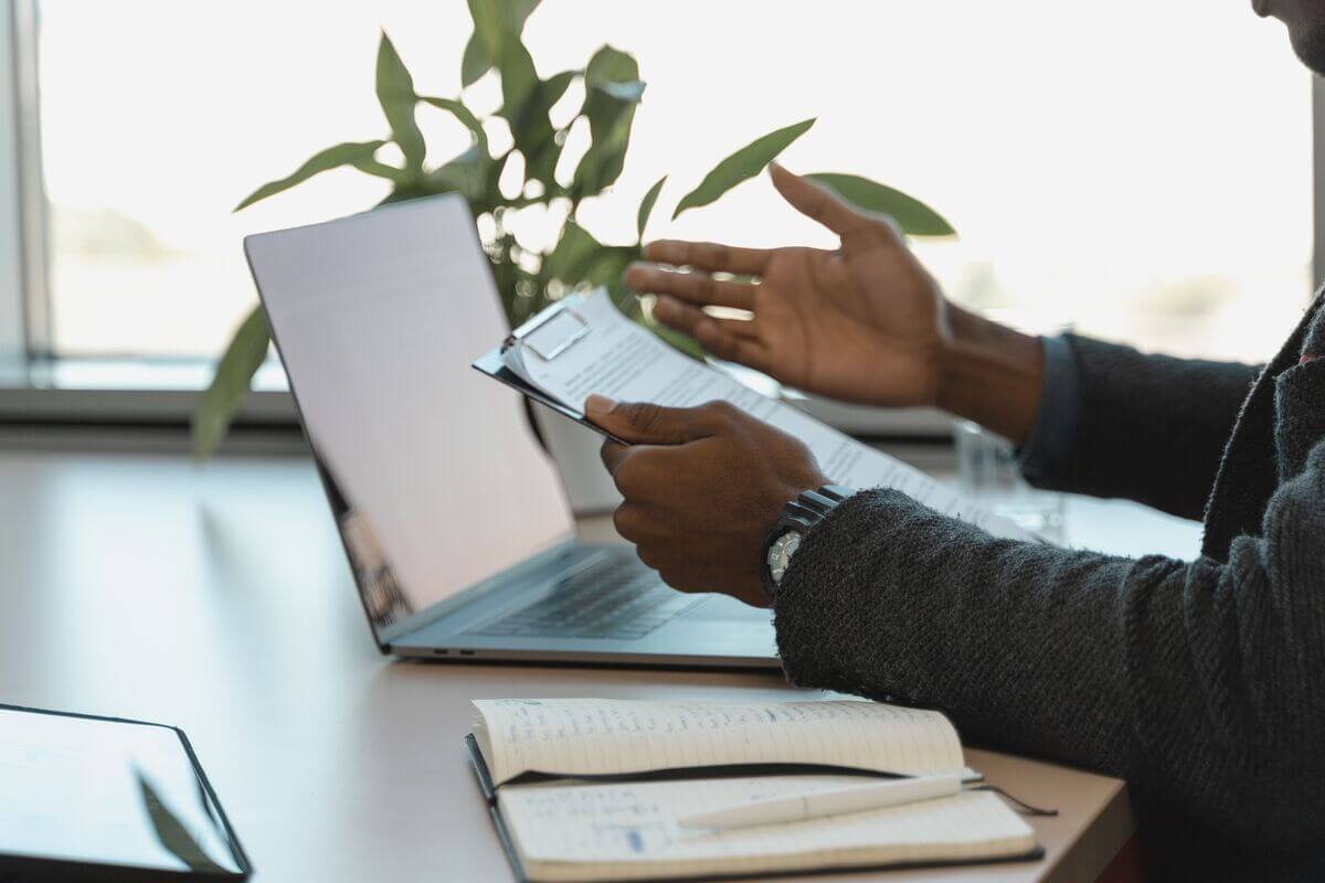 Interviewer talking to a candidate about an HR job opening